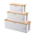 Compact bamboo cable organizer box with a lift-off lid