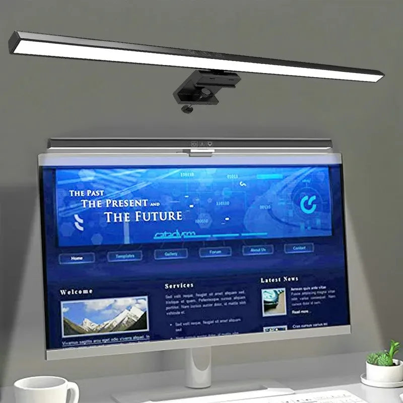 Dimmable monitor light bar mounted on top of a computer display