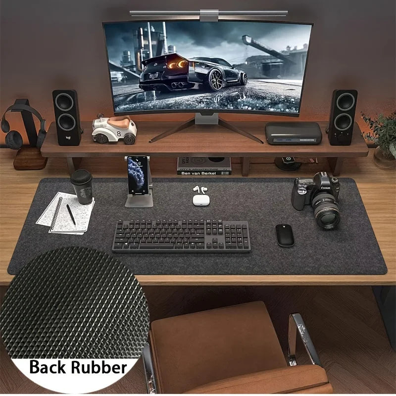 Extra large wool felt deskpad covering a wide desk surface