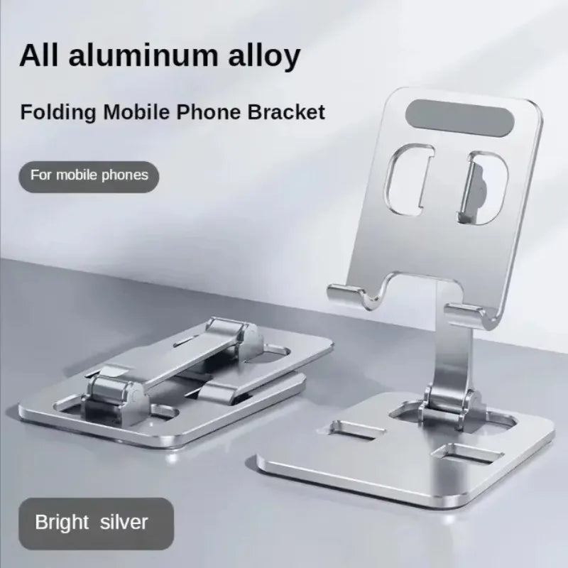 Foldable aluminum phone stand holding a phone upright on a desk