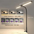 Clip-on architect style desk lamp with an adjustable arm