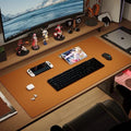 Leather keyboard and mouse mat sized for a compact desk