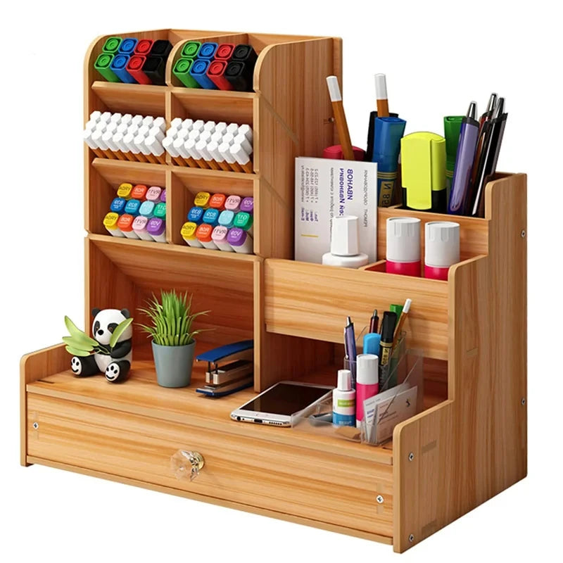 Wooden desk organizer with an open drawer and pen compartments