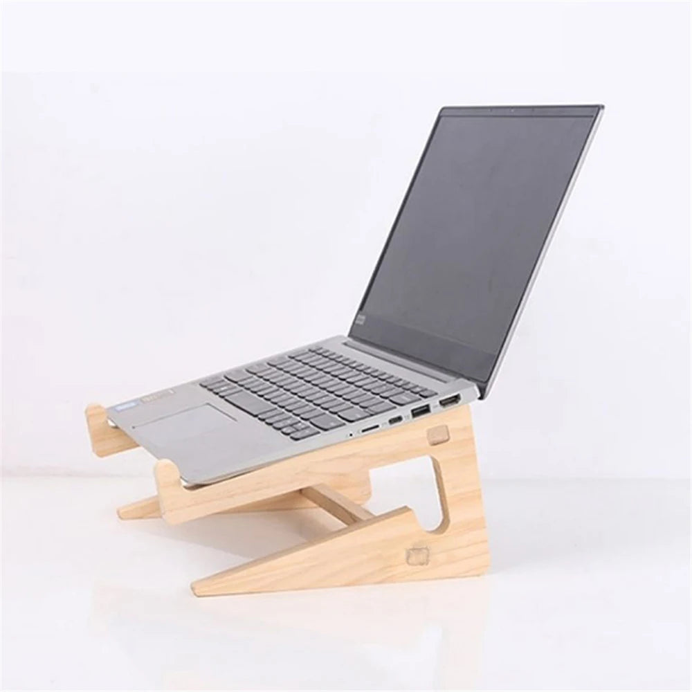 Detachable wooden laptop riser lifting a notebook for airflow