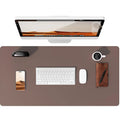 Large vegan leather desk protector laid across a work surface