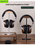 Minimalist walnut headphone rack with a clean sculptural profile